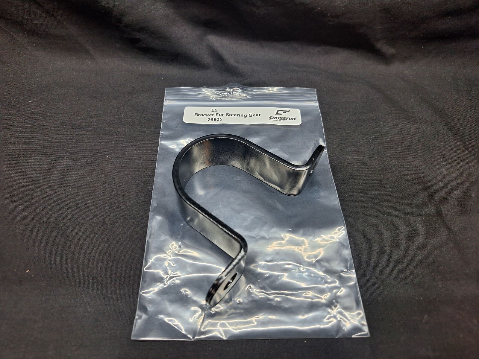 BRACKET, STEERING E5