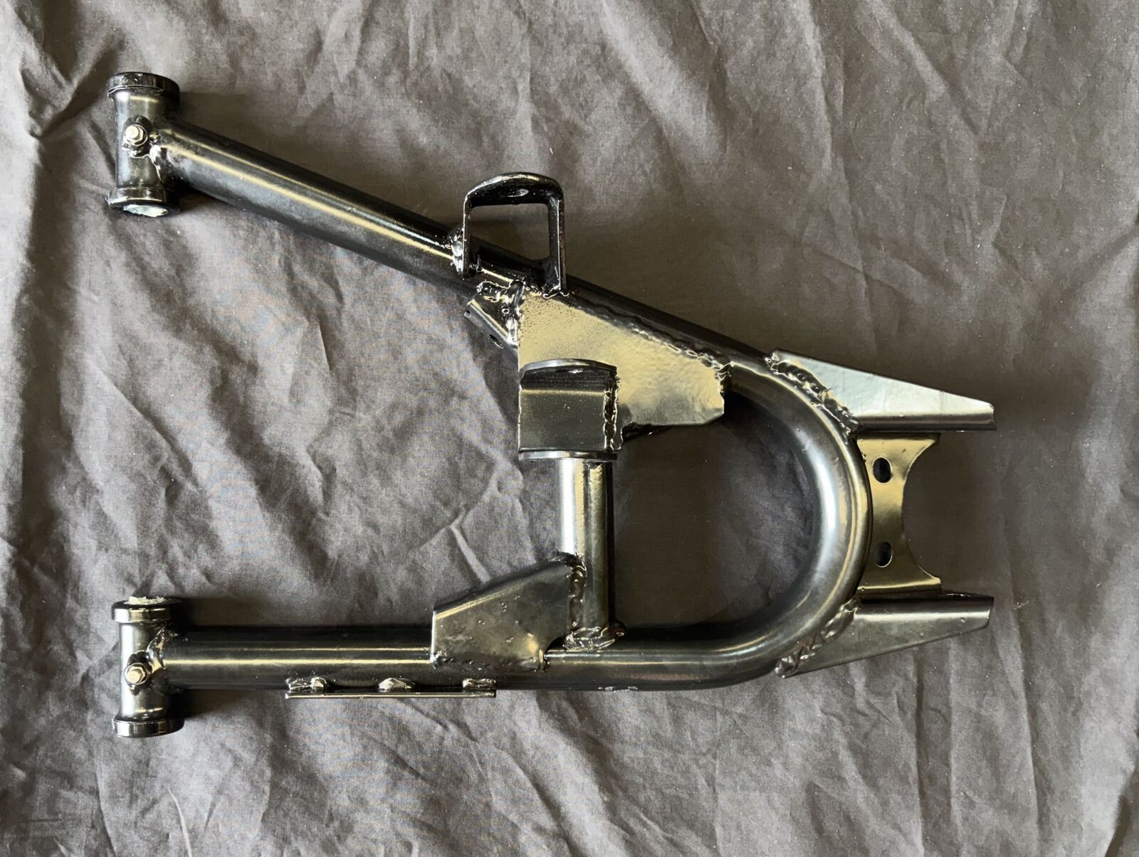 Lower A-Arm Welding, Rear, R E10 / E10 CREW / E10 CARGO