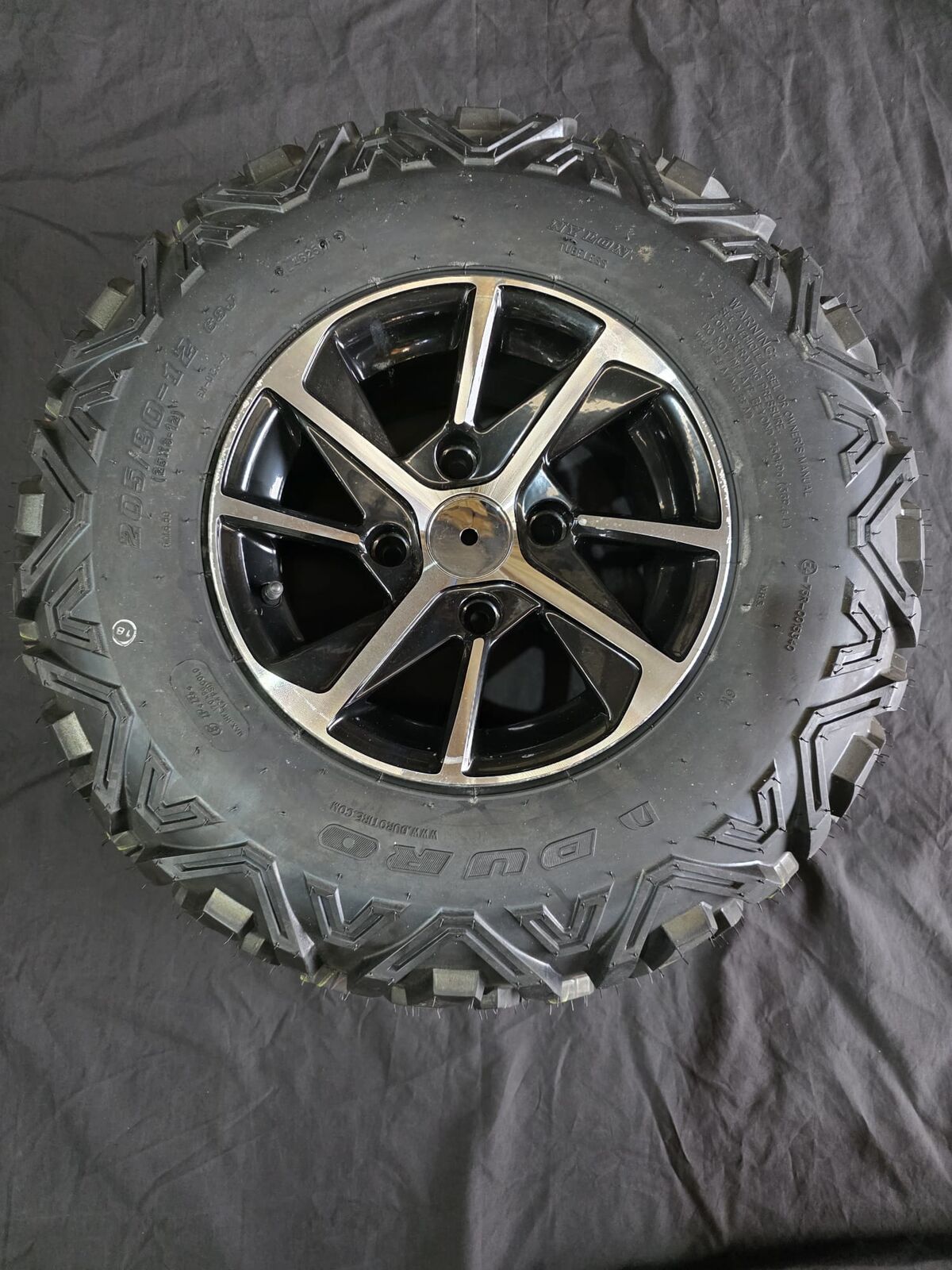 E10 / E10 CREW / E10 CARGO Wheel Assembly Front Left (AL) 25X8-12 Off Road